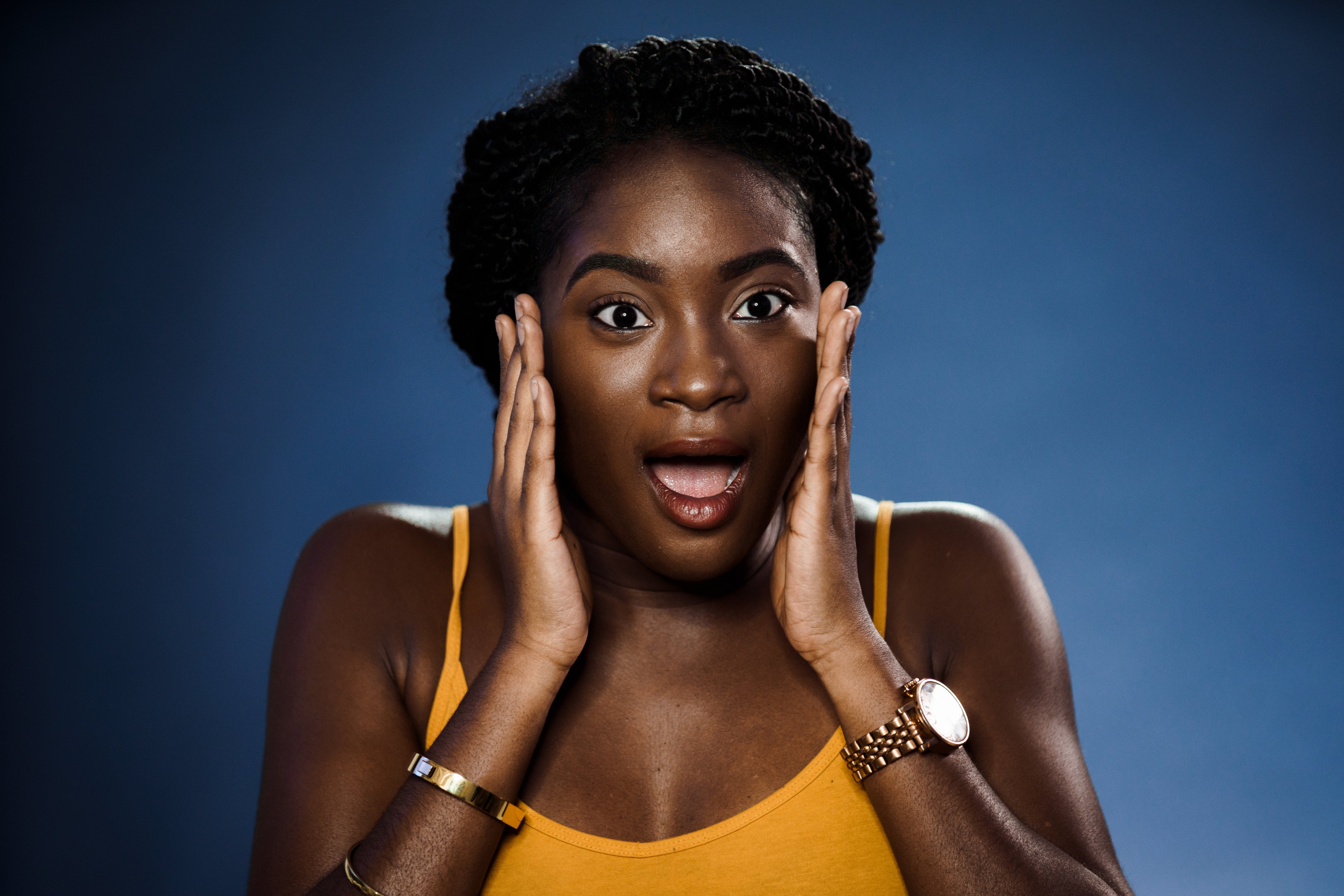 Woman pleasantly surprised by simple skincare results